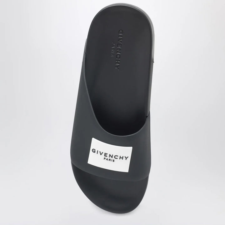 Givenchy - Label flat mules in black rubber Brand Shoes
