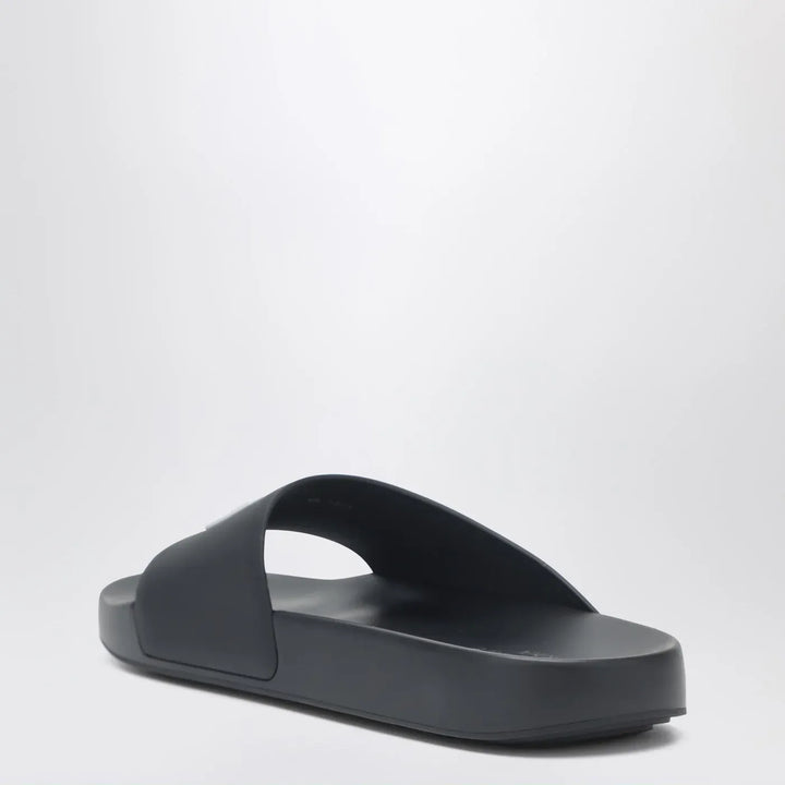 Givenchy - Label flat mules in black rubber Brand Shoes