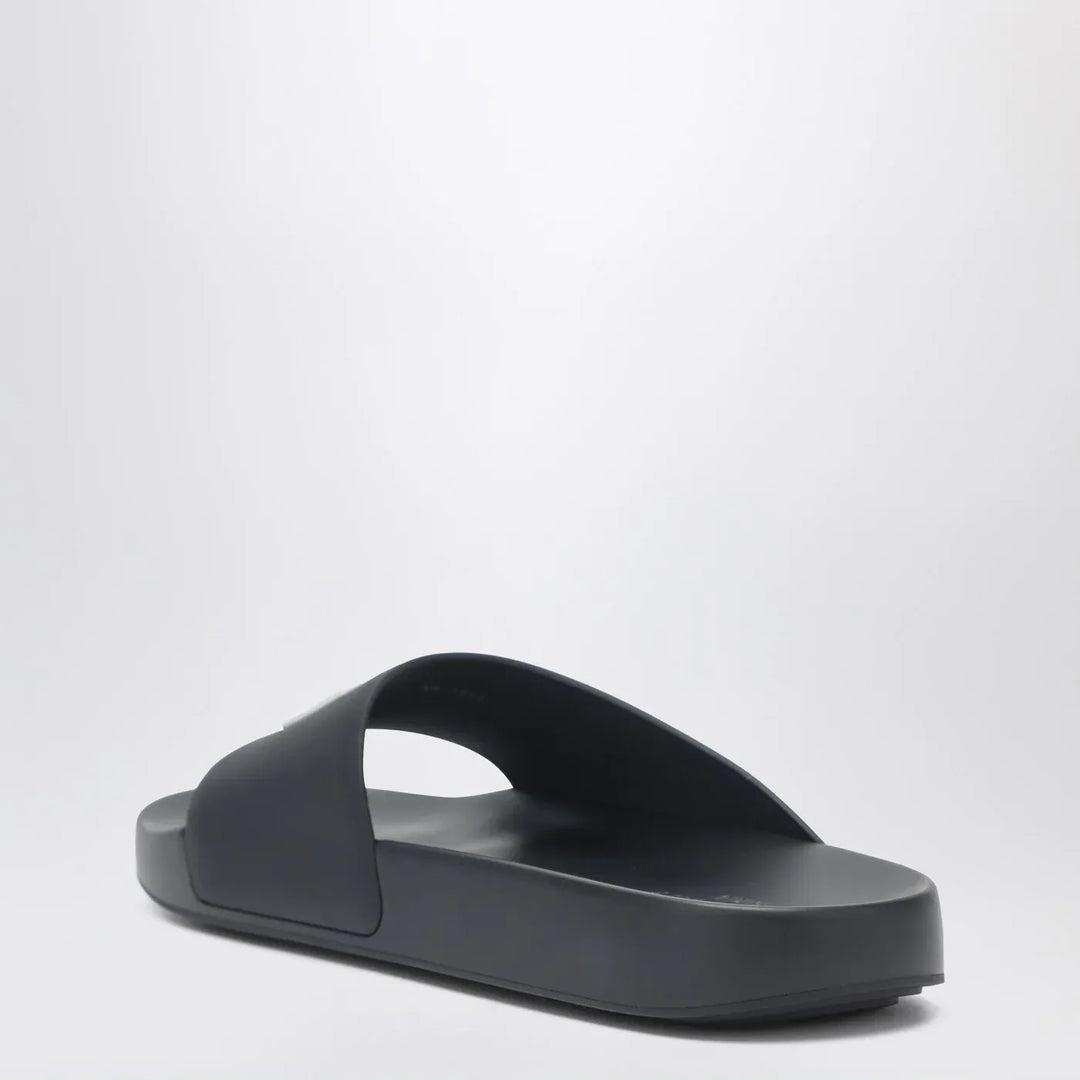 Givenchy - Label flat mules in black rubber Brand Shoes